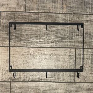 Sleek Black Metal Hanger with Hooks